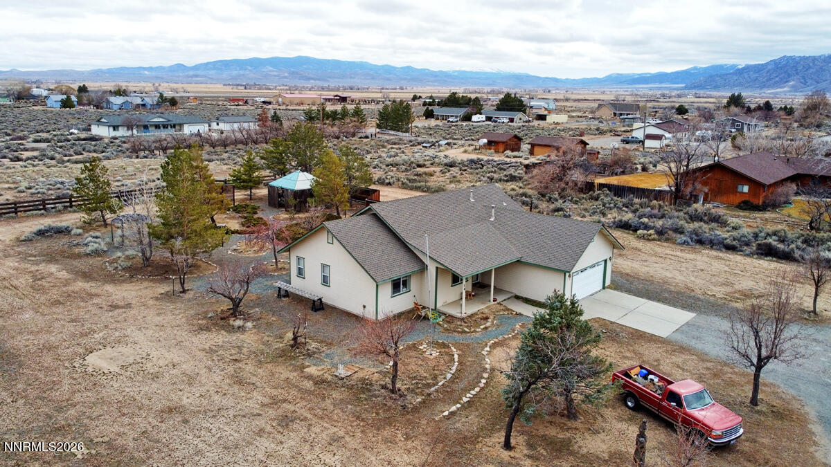 16 Mesa Drive Smith Valley, NV 89444 - Photo 2 of 33 an aerial view of a house with a mountain view