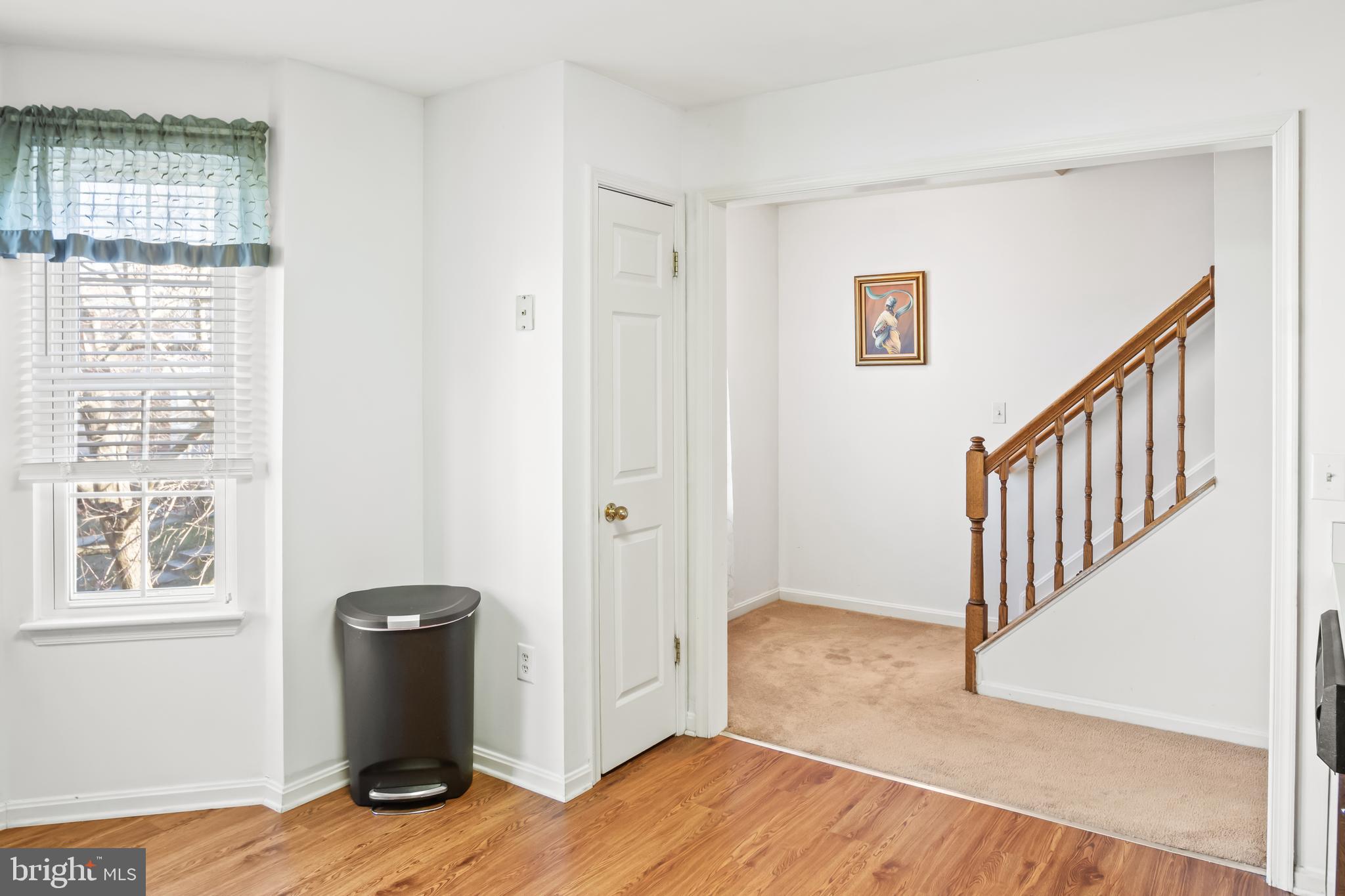 2230 Conquest Way Odenton, MD 21113 - Photo 19 of 47 a view of an empty room with window and wooden floor