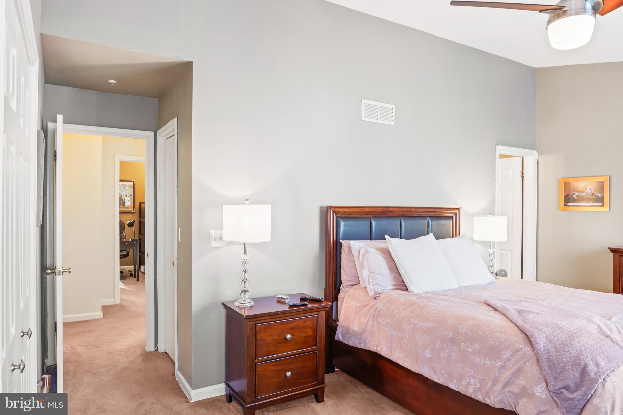 2230 Conquest Way Odenton, MD 21113 - Photo 30 of 47 a bedroom with a bed and a cabinets