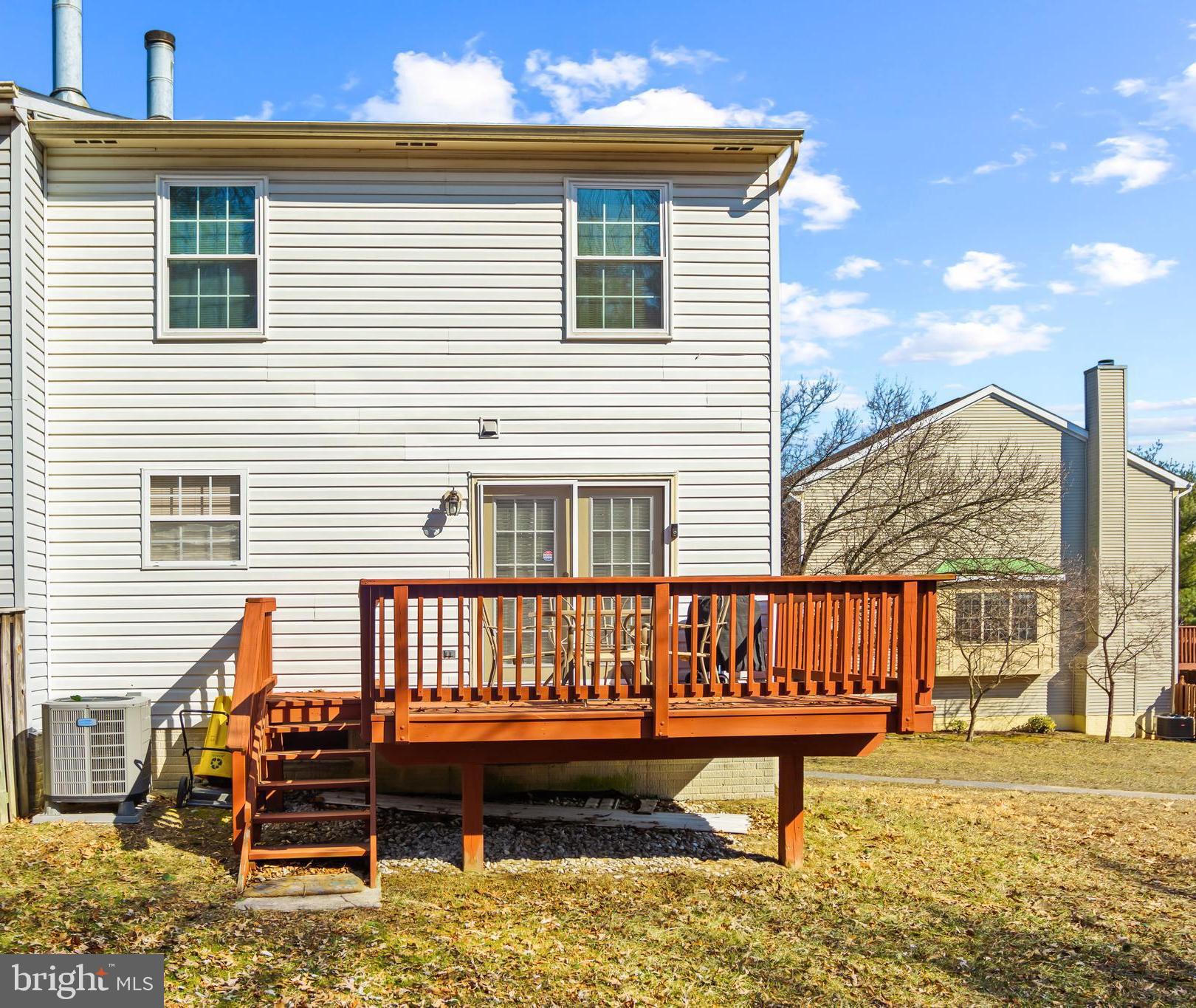 2230 Conquest Way Odenton, MD 21113 - Photo 39 of 47 a view of a house with a wooden deck