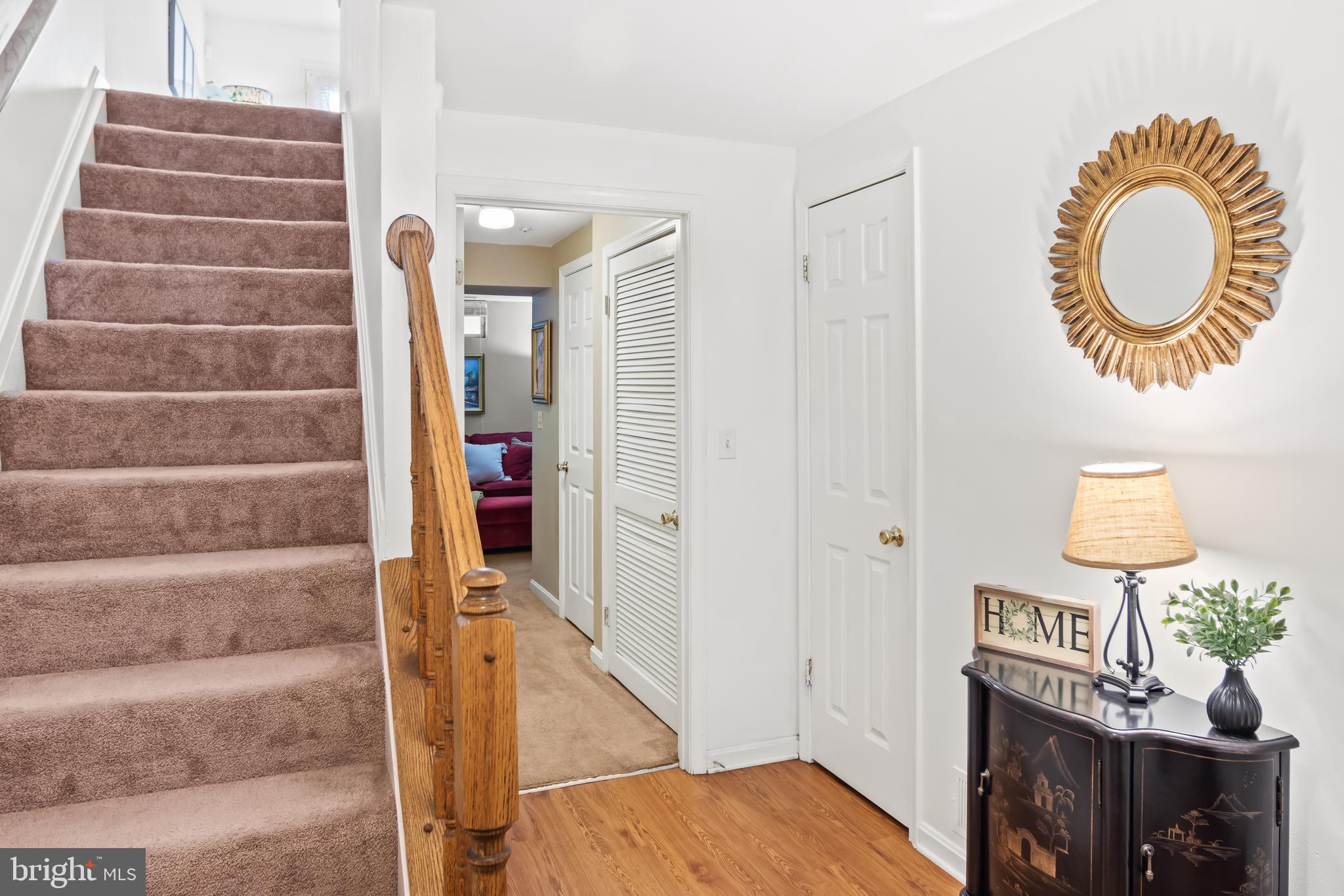 2230 Conquest Way Odenton, MD 21113 - Photo 4 of 47 a view of a bedroom with wooden floor and bathroom