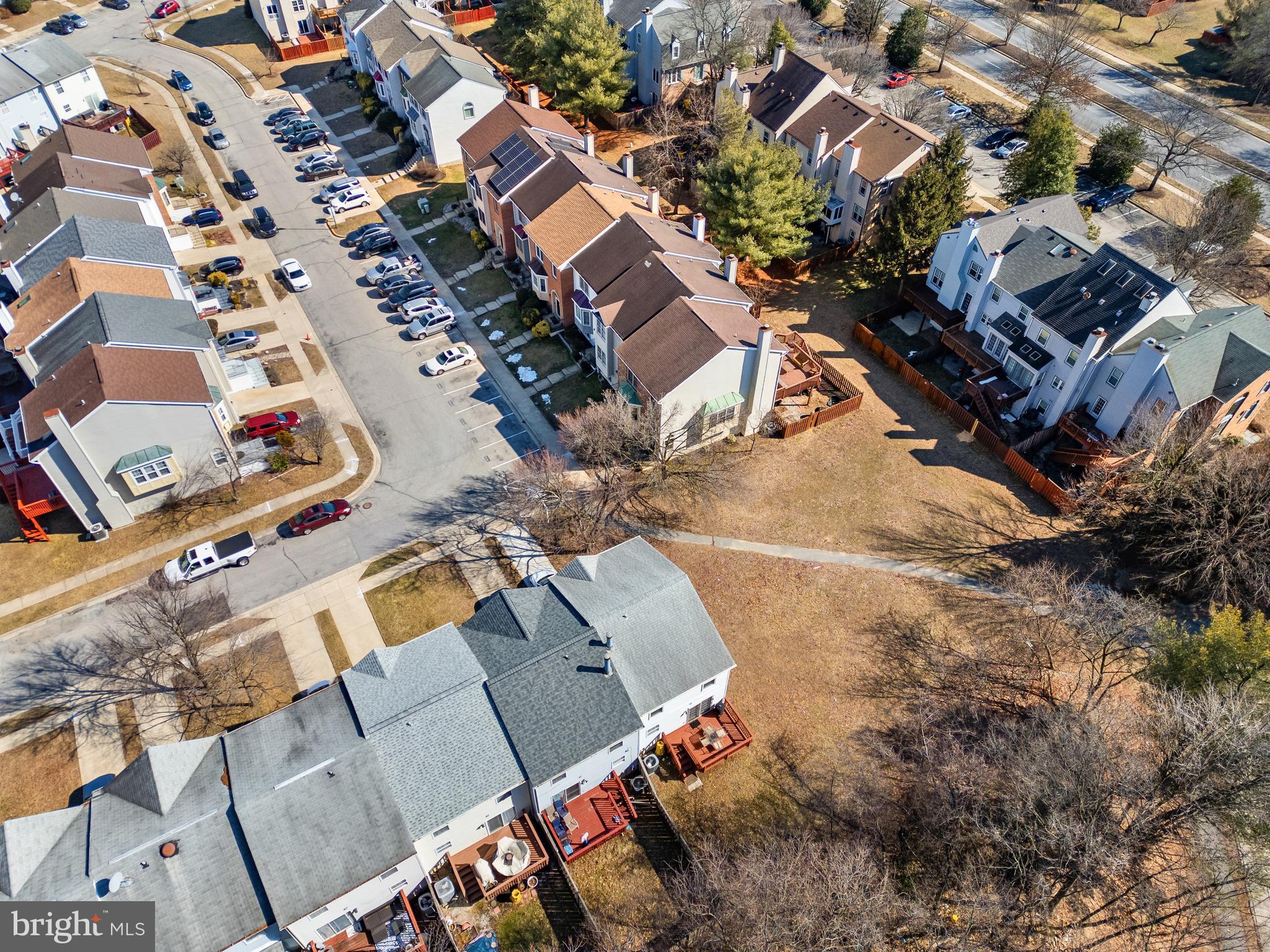 2230 Conquest Way Odenton, MD 21113 - Photo 47 of 47 an aerial view of a house with a yard