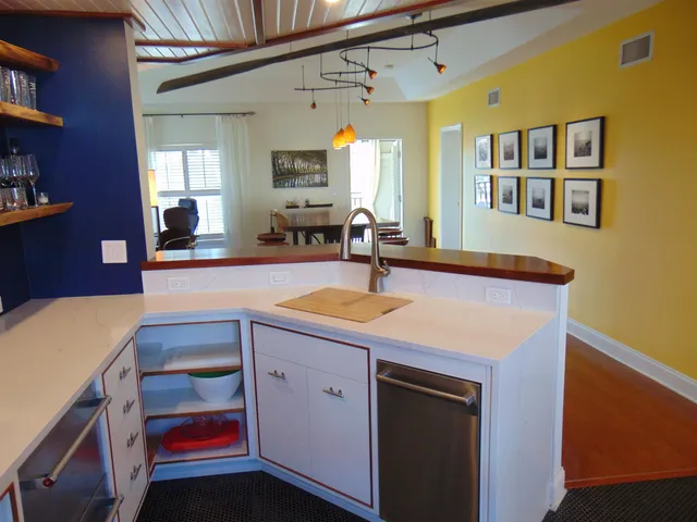 a kitchen with a sink and cabinets