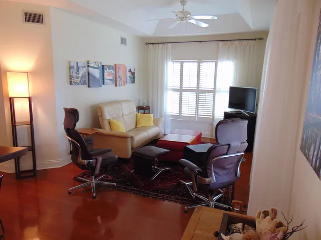 a living room with furniture and a window
