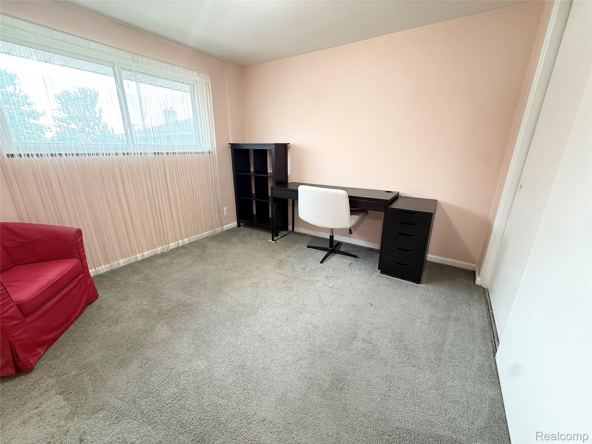 11012 Middlebelt Road Livonia, MI 48150 - Photo 10 of 14 Room with neutral-toned carpeting and light-colored walls