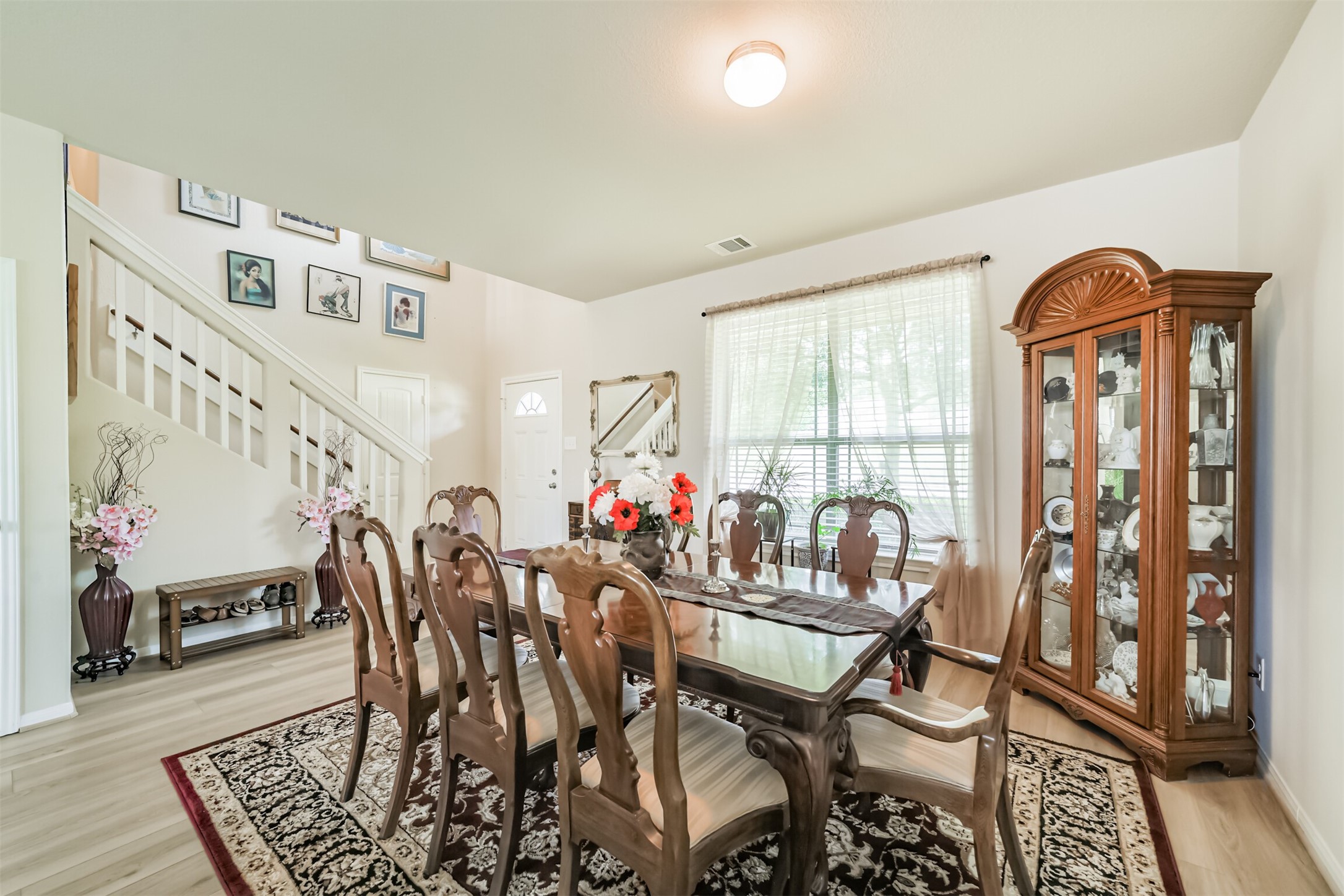 12009 La Salle River Road Conroe, TX 77304 - Photo 9 of 50 a view of a dining room with furniture window and outside view