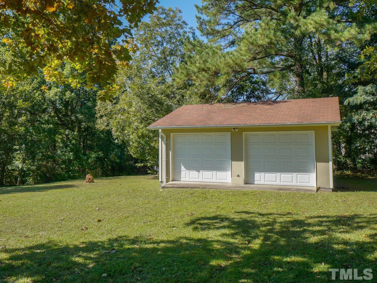 2901 Mars Street Raleigh, NC 27604 - Photo 25 of 26 a view of a house with a yard