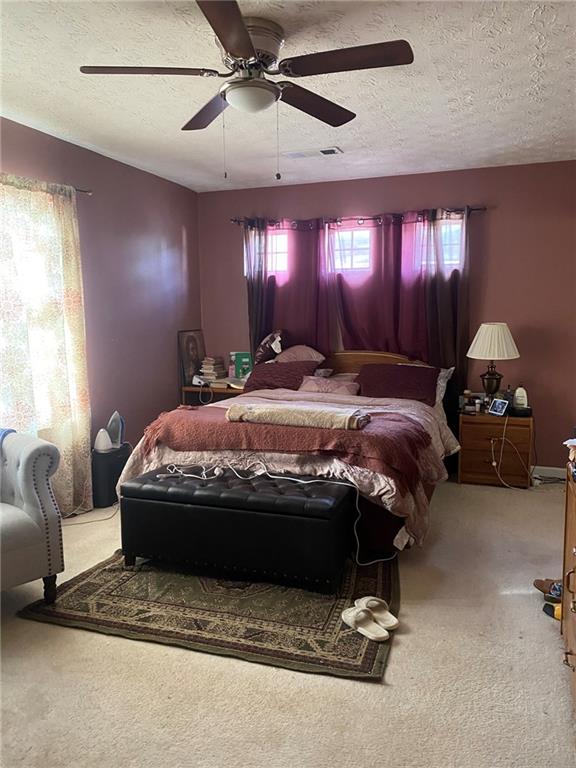 159 Windcroft Lane Northwest Acworth, GA 30101 - Photo 12 of 25 a bedroom with a bed and window