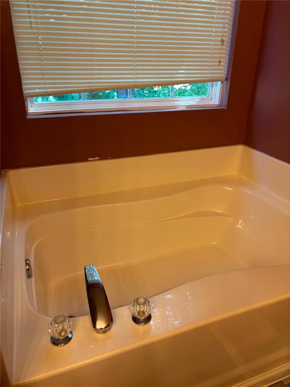 159 Windcroft Lane Northwest Acworth, GA 30101 - Photo 14 of 25 a view of a bathtub in a bathroom