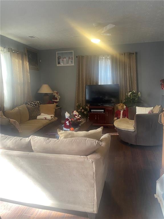 159 Windcroft Lane Northwest Acworth, GA 30101 - Photo 2 of 25 a living room with furniture and a flat screen tv