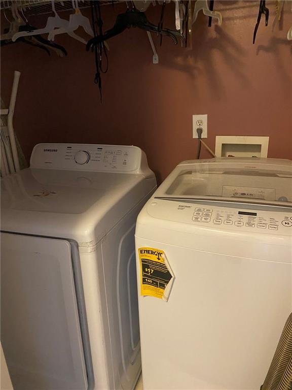 159 Windcroft Lane Northwest Acworth, GA 30101 - Photo 23 of 25 a utility room with dryer and washer