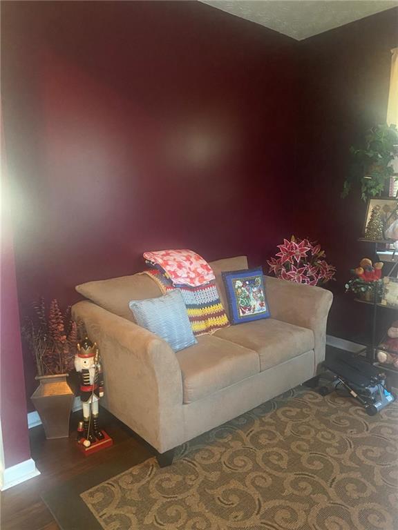 159 Windcroft Lane Northwest Acworth, GA 30101 - Photo 4 of 25 a bedroom with a bed and a chandelier