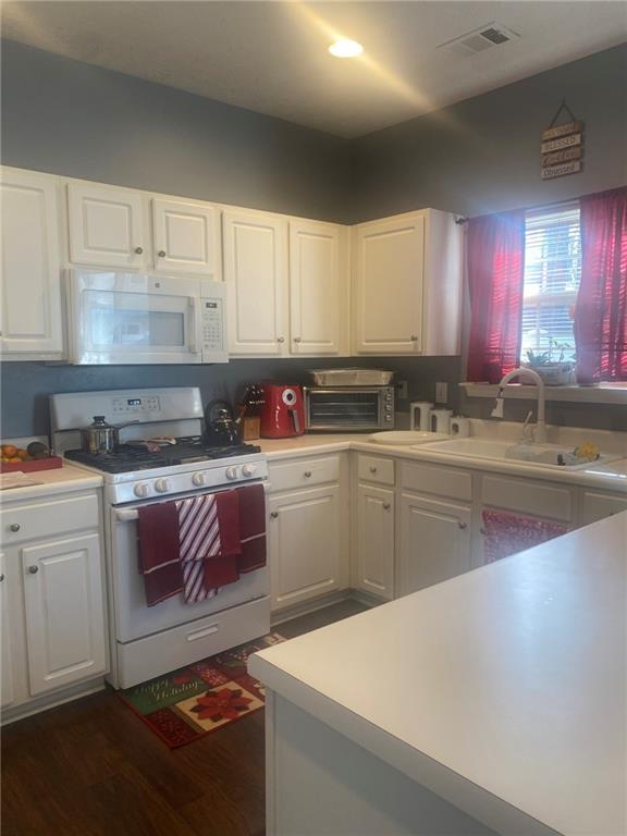 159 Windcroft Lane Northwest Acworth, GA 30101 - Photo 5 of 25 a kitchen with a sink cabinets and appliances