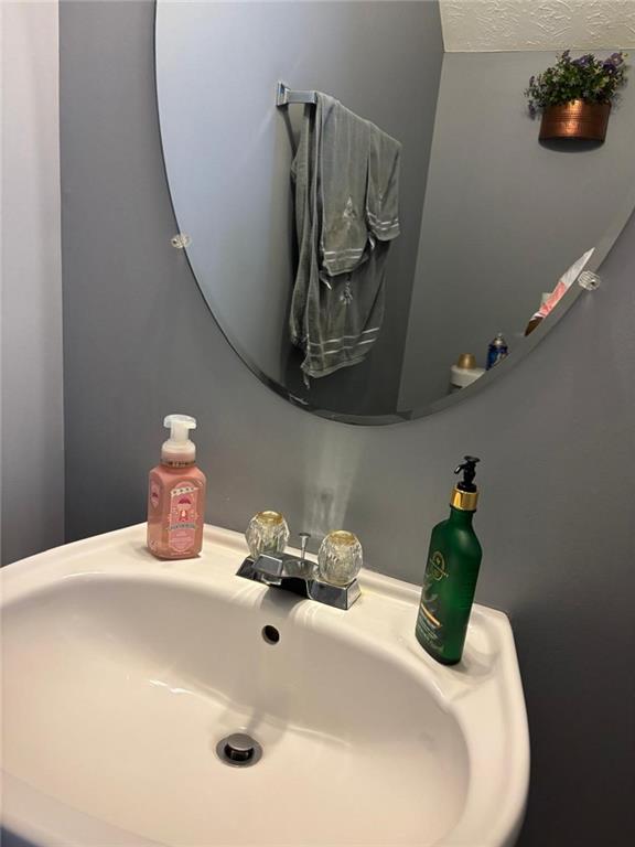 159 Windcroft Lane Northwest Acworth, GA 30101 - Photo 10 of 25 a bathroom with a sink and a mirror