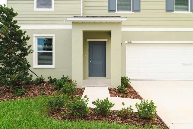 a view of a city with an ocean view