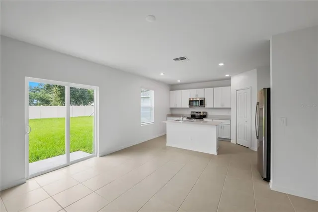 an empty room with a bathroom