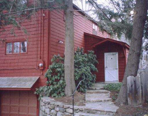130 Good Hill Road Weston, CT 06883 - Photo 1 of 1 a front view of a house with garden