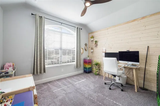 a view of a kitchen with a sink and a window