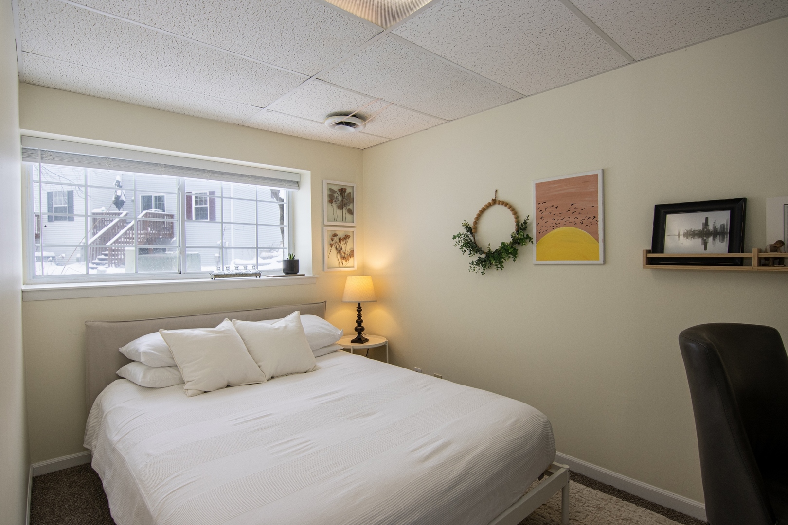 1213 Koster Court Geneva, IL 60134 - Photo 19 of 30 a bedroom with a bed and a painting on the wall