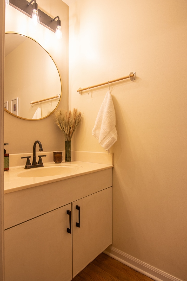 1213 Koster Court Geneva, IL 60134 - Photo 9 of 30 a bathroom with a sink and mirror