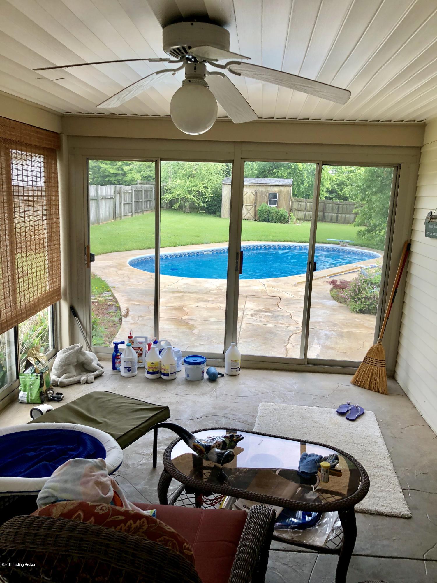 330 Colt Run Road Simpsonville, KY 40067 - Photo 13 of 15 Glassed in sun room / porch over looks the pool and awesome fenced yard