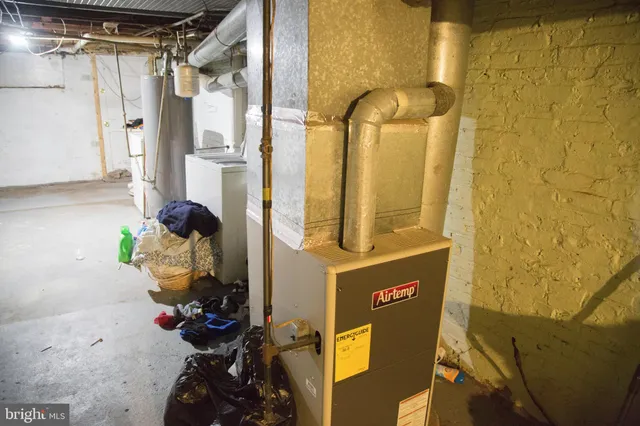 a bathroom with a mirror and a shower