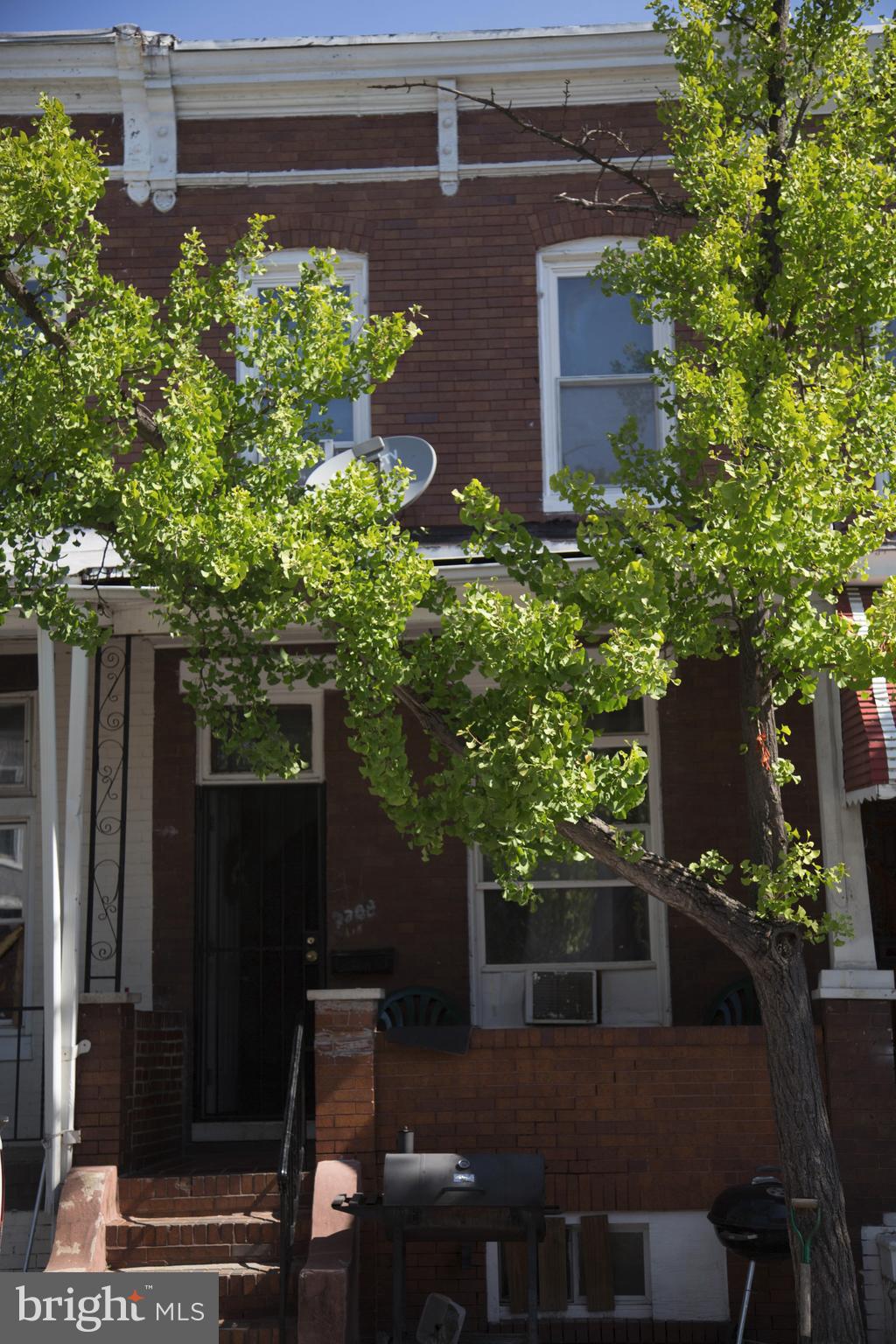 1708 Normal Avenue Baltimore, MD 21213 - Photo 18 of 18 a backyard of a house with lots of green space
