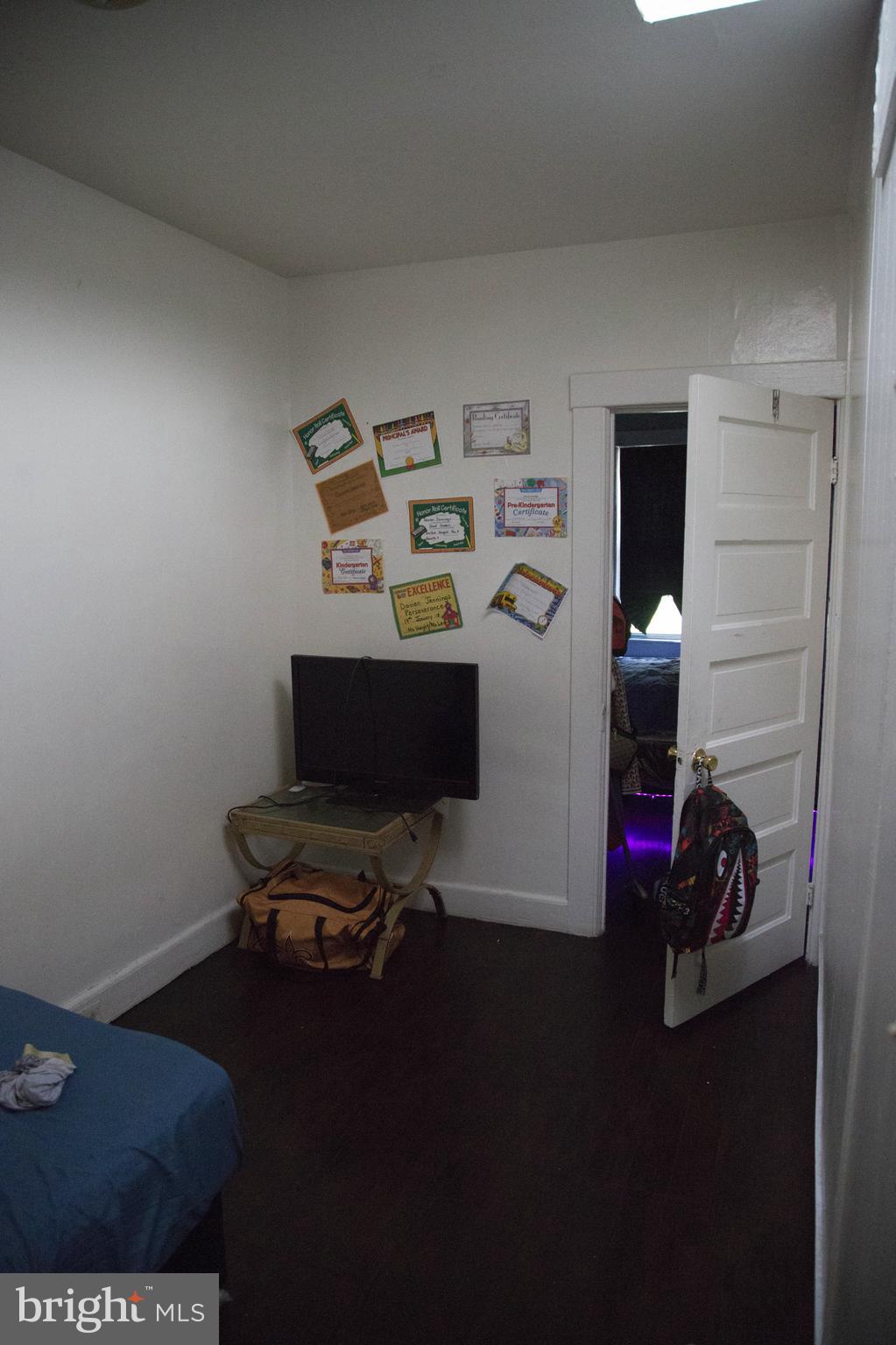 1708 Normal Avenue Baltimore, MD 21213 - Photo 8 of 18 a room with a workspace