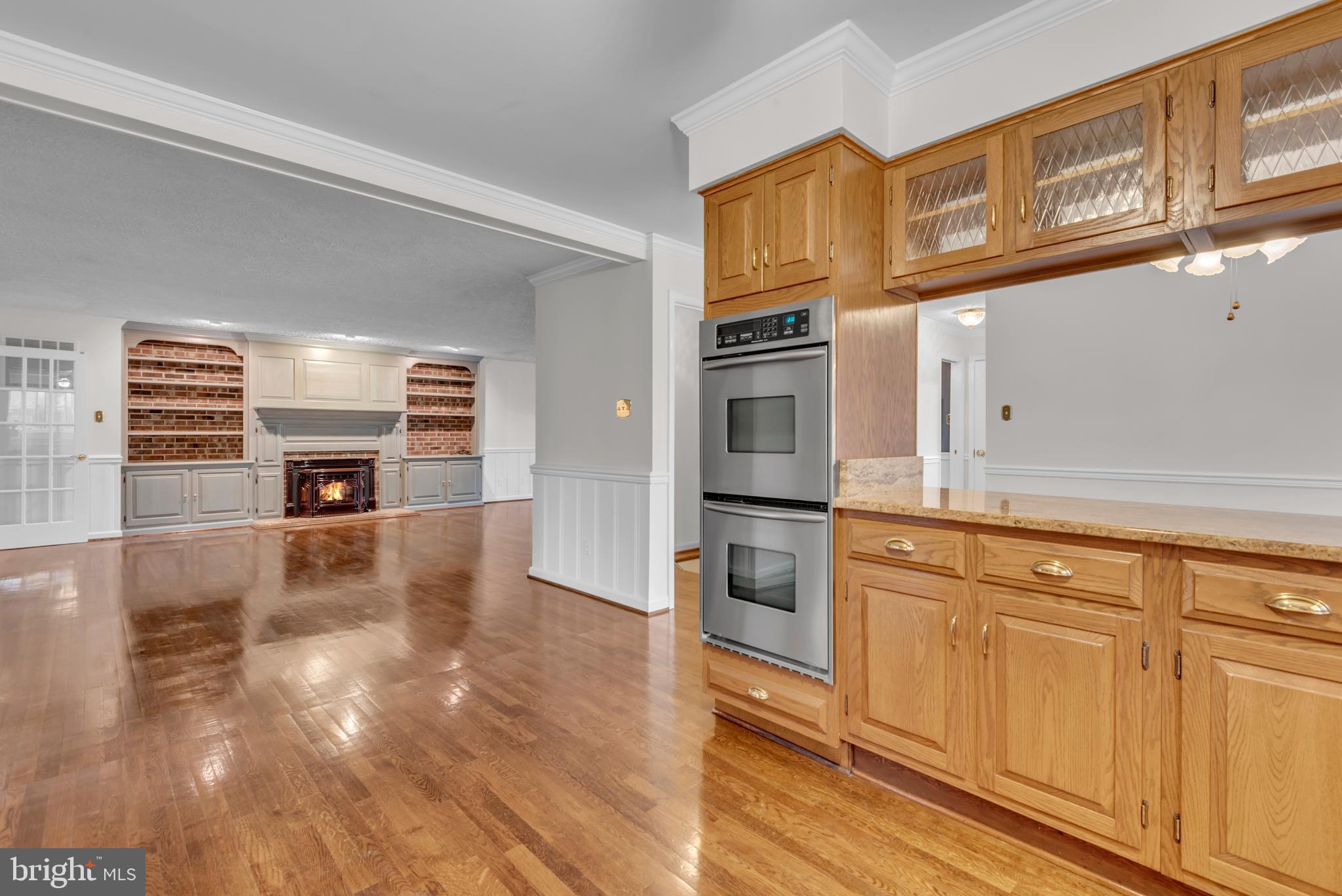 671 Discovery Court Davidsonville, MD 21035 - Photo 33 of 71 a kitchen with stainless steel appliances granite countertop a stove and a refrigerator