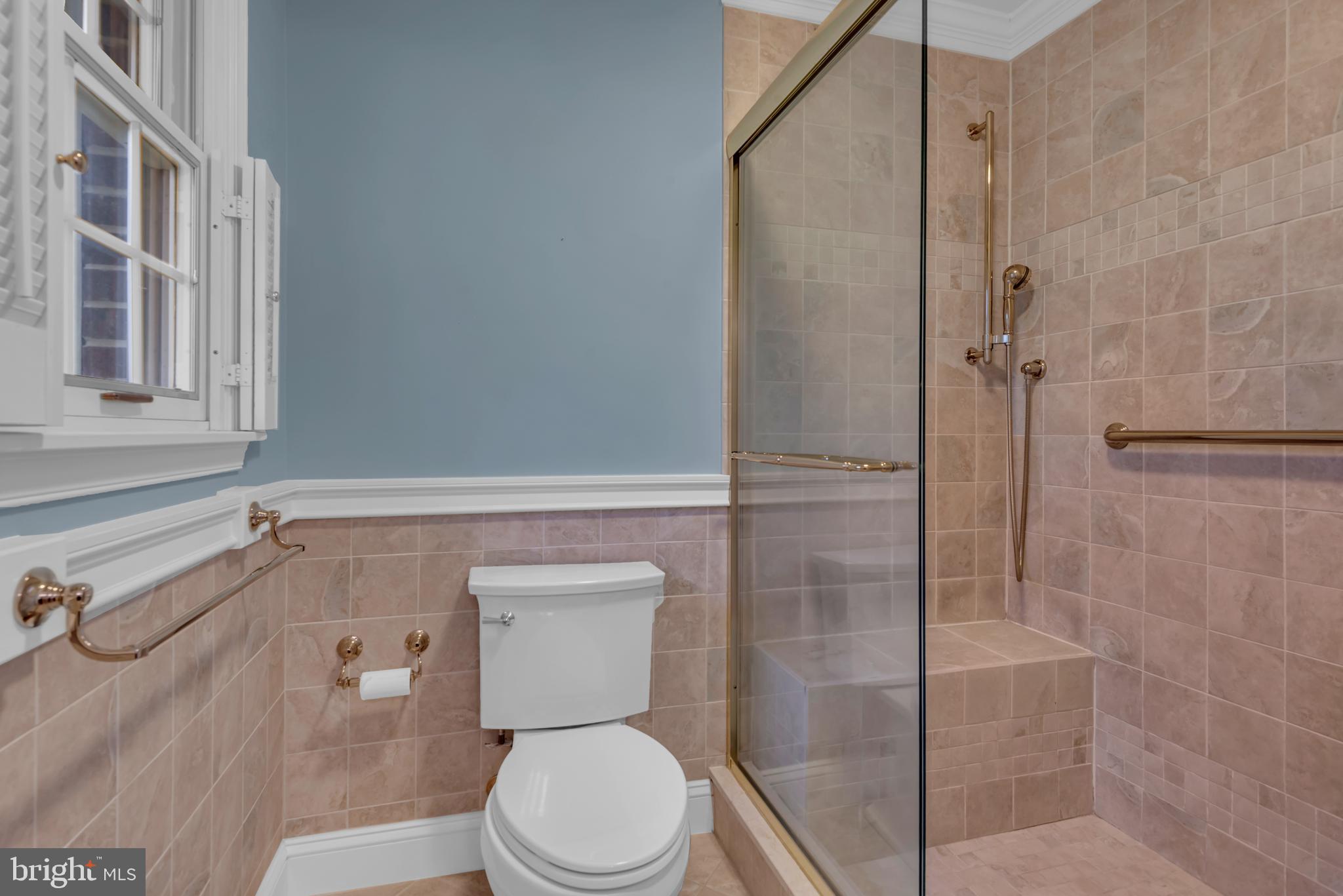 671 Discovery Court Davidsonville, MD 21035 - Photo 45 of 71 a bathroom with a toilet and a shower