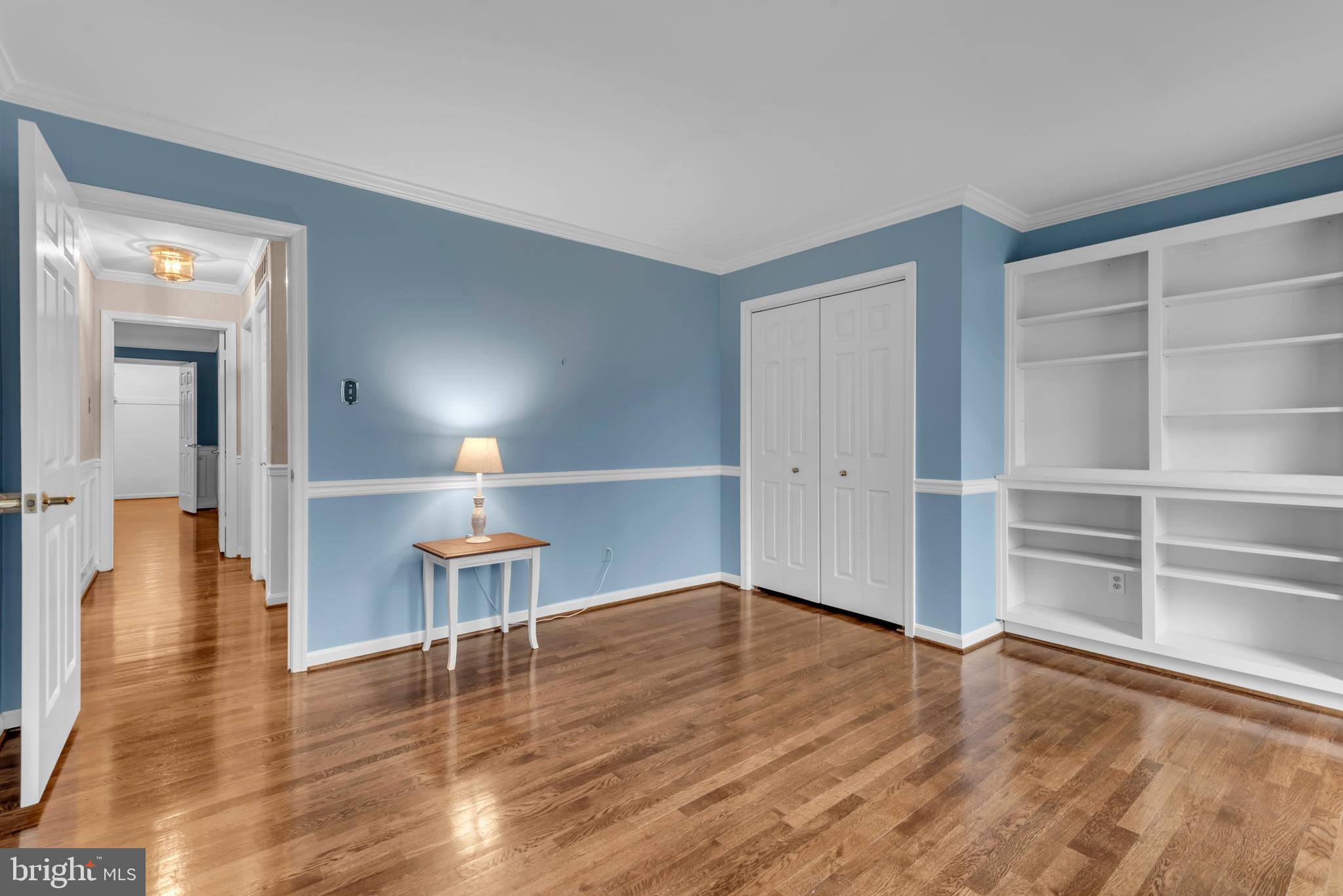 671 Discovery Court Davidsonville, MD 21035 - Photo 46 of 71 a view of empty room with wooden floor