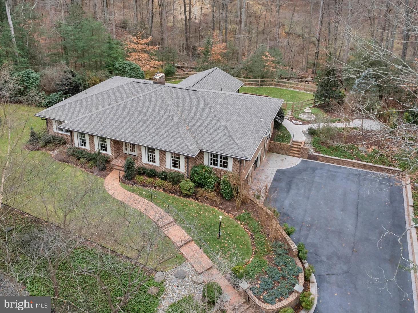 671 Discovery Court Davidsonville, MD 21035 - Photo 5 of 71 a aerial view of a house with a yard table and chairs
