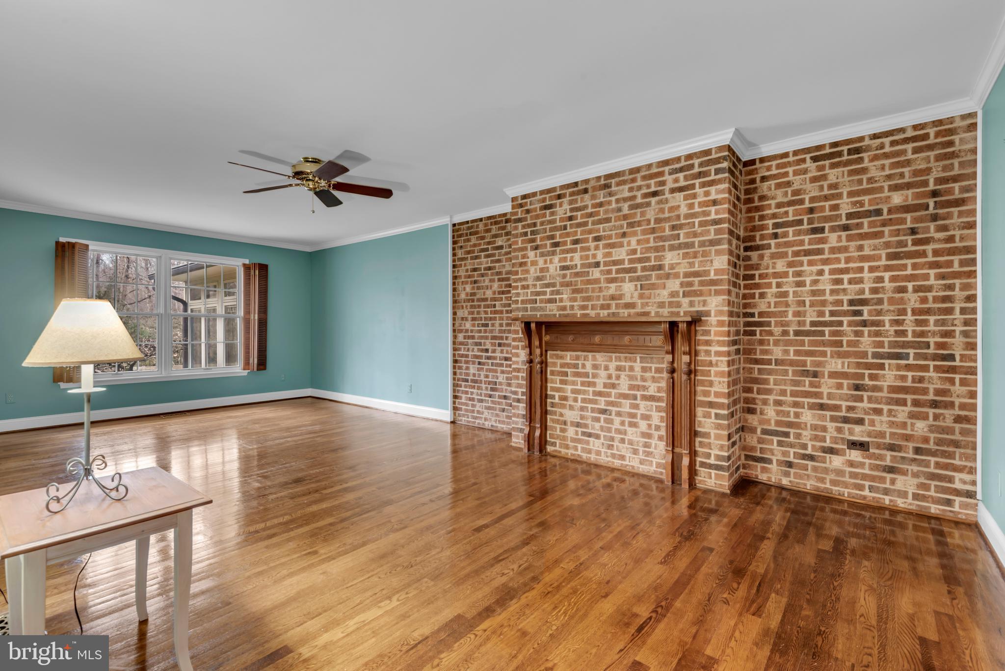 671 Discovery Court Davidsonville, MD 21035 - Photo 51 of 71 a view of empty room with wooden floor and fan