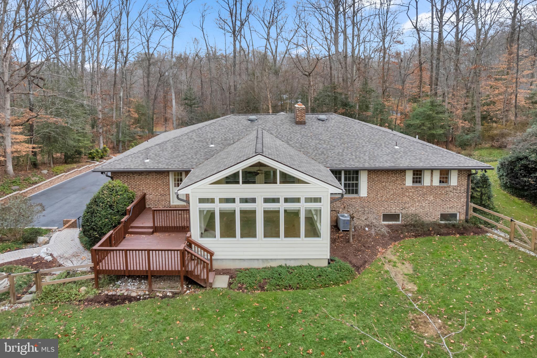 671 Discovery Court Davidsonville, MD 21035 - Photo 8 of 71 a aerial view of a house next to a big yard and large trees