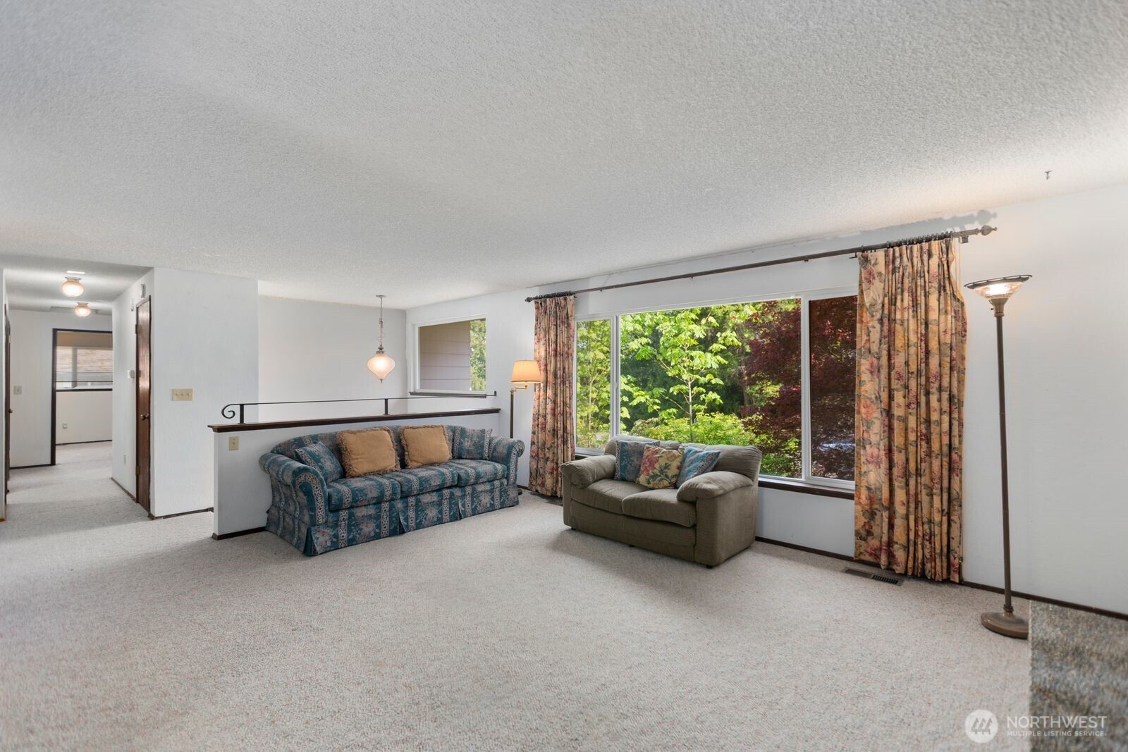 21627 9th Place West Bothell, WA 98021 - Photo 8 of 40 a living room with furniture and a large window