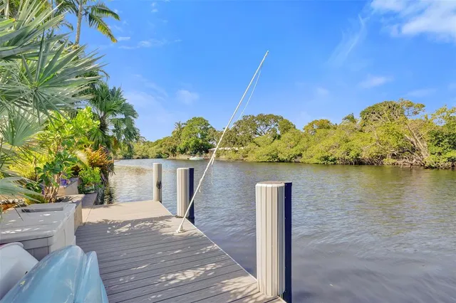 a deck view with a lake view