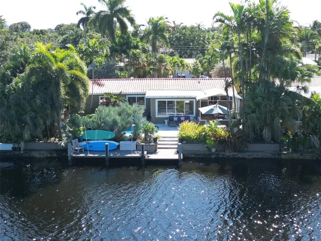a view of a lake with sitting area