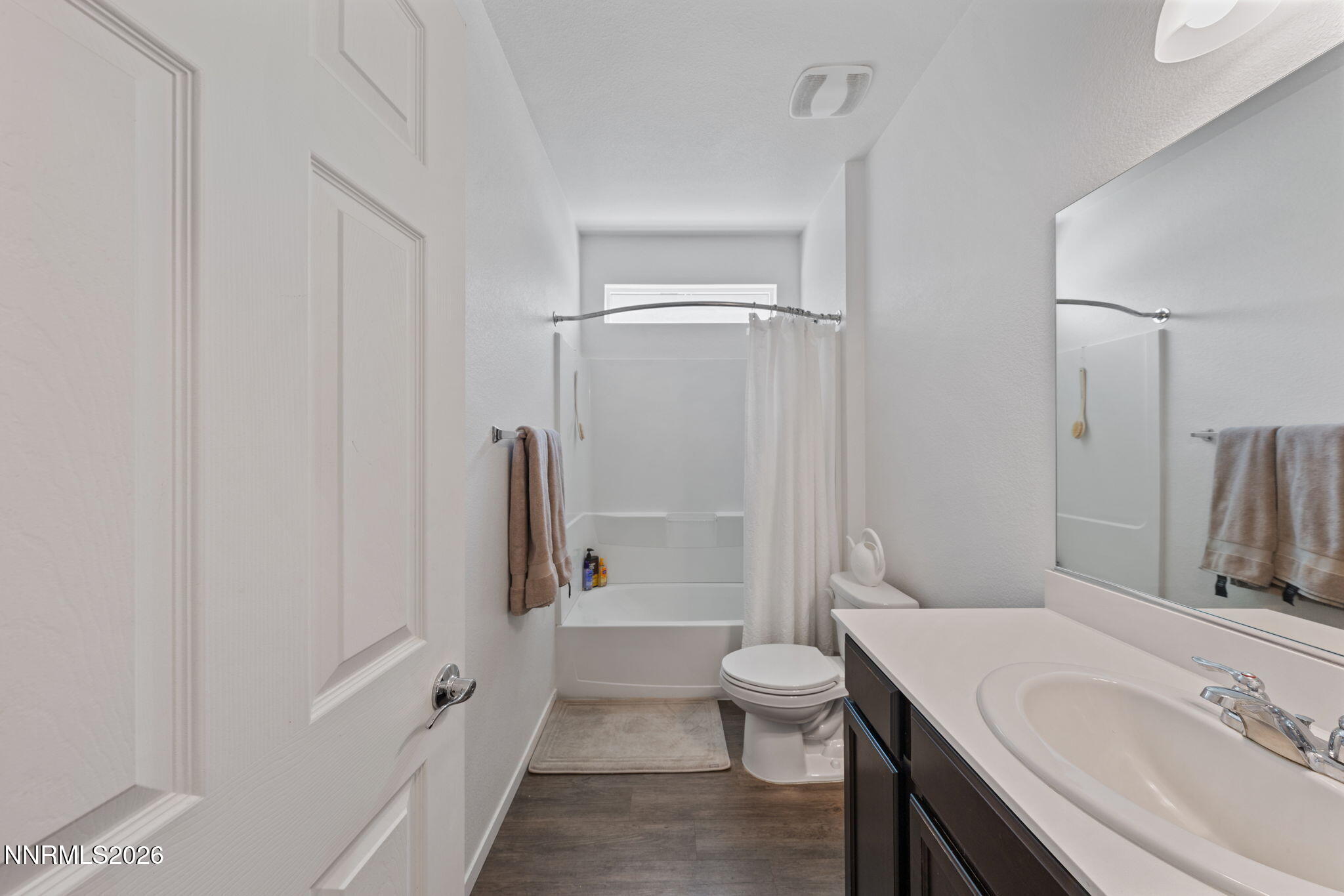 9708 Sea Glass Drive Reno, NV 89506 - Photo 7 of 51 a bathroom with a sink toilet tub and shower
