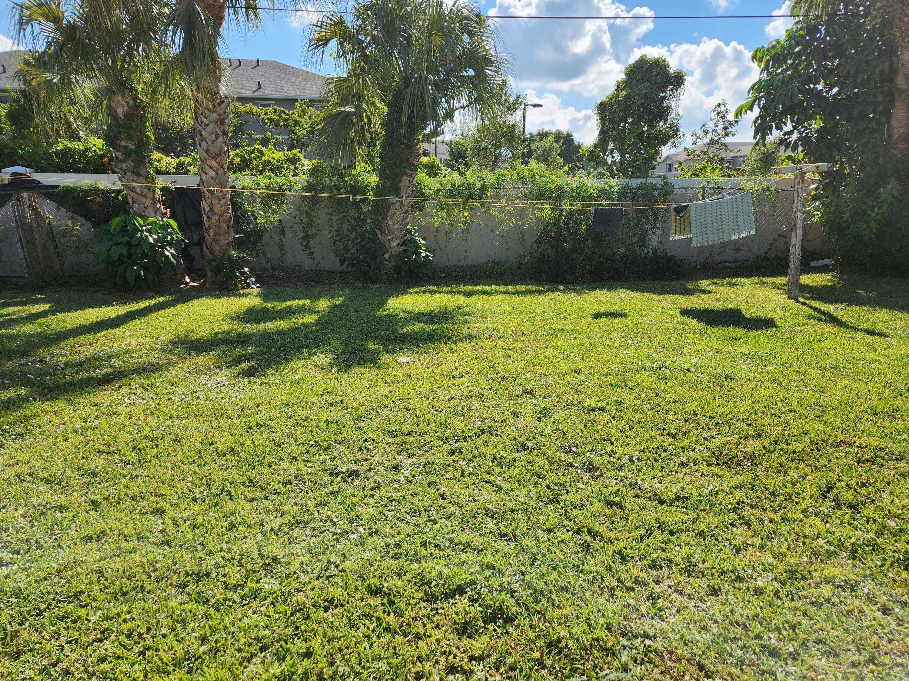 65 West 34th Street, Unit A Riviera Beach, FL 33404 - Photo 17 of 17 a view of a backyard
