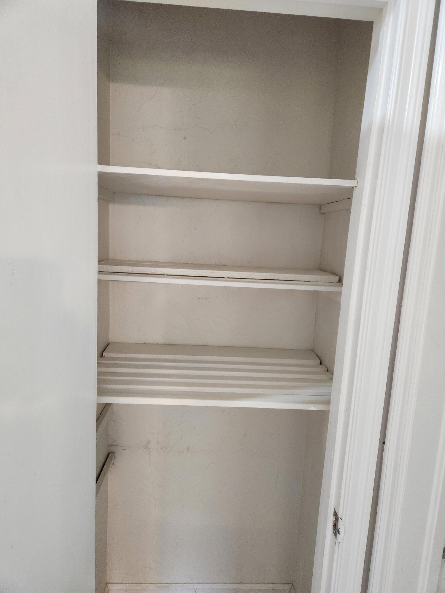 65 West 34th Street, Unit A Riviera Beach, FL 33404 - Photo 6 of 17 a close view of closet