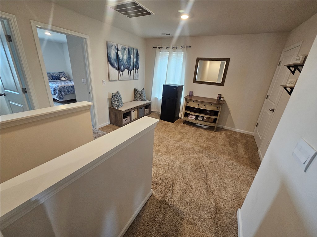 902 Ashwood Lane Easley, SC 29640 - Photo 16 of 39 A versatile open landing, perfect for a cozy reading nook or functional storage solutions.