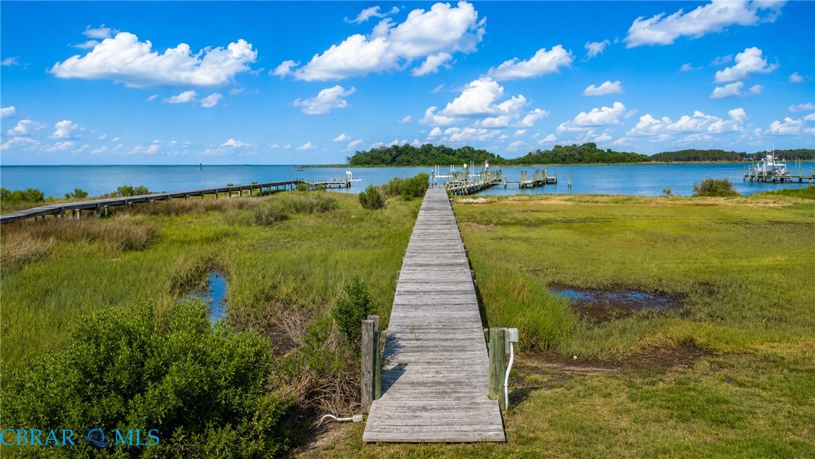 1214 Dandy Loop Road Yorktown, VA 23692 - Photo 5 of 65 a view of a lake with a big yard