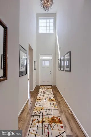 a kitchen with granite countertop a sink stainless steel appliances and cabinets