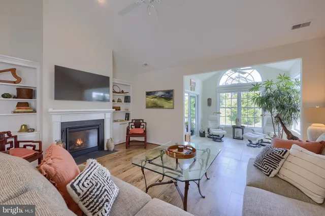 a kitchen with a sink cabinets and window