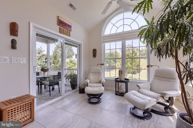 a view of staircase with rug