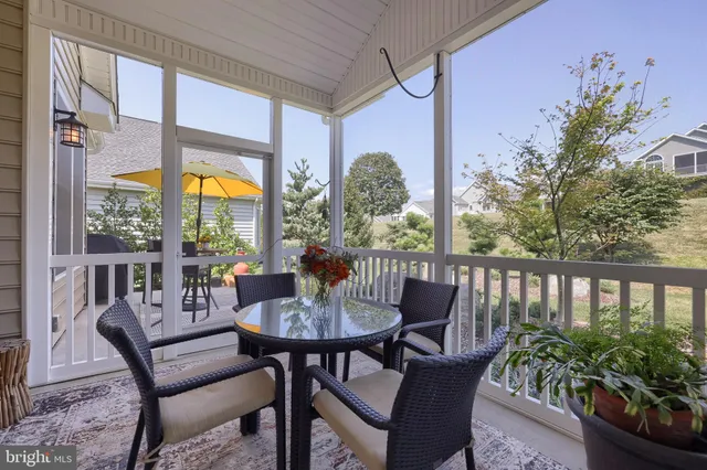 a view of an outdoor sitting area with golf course