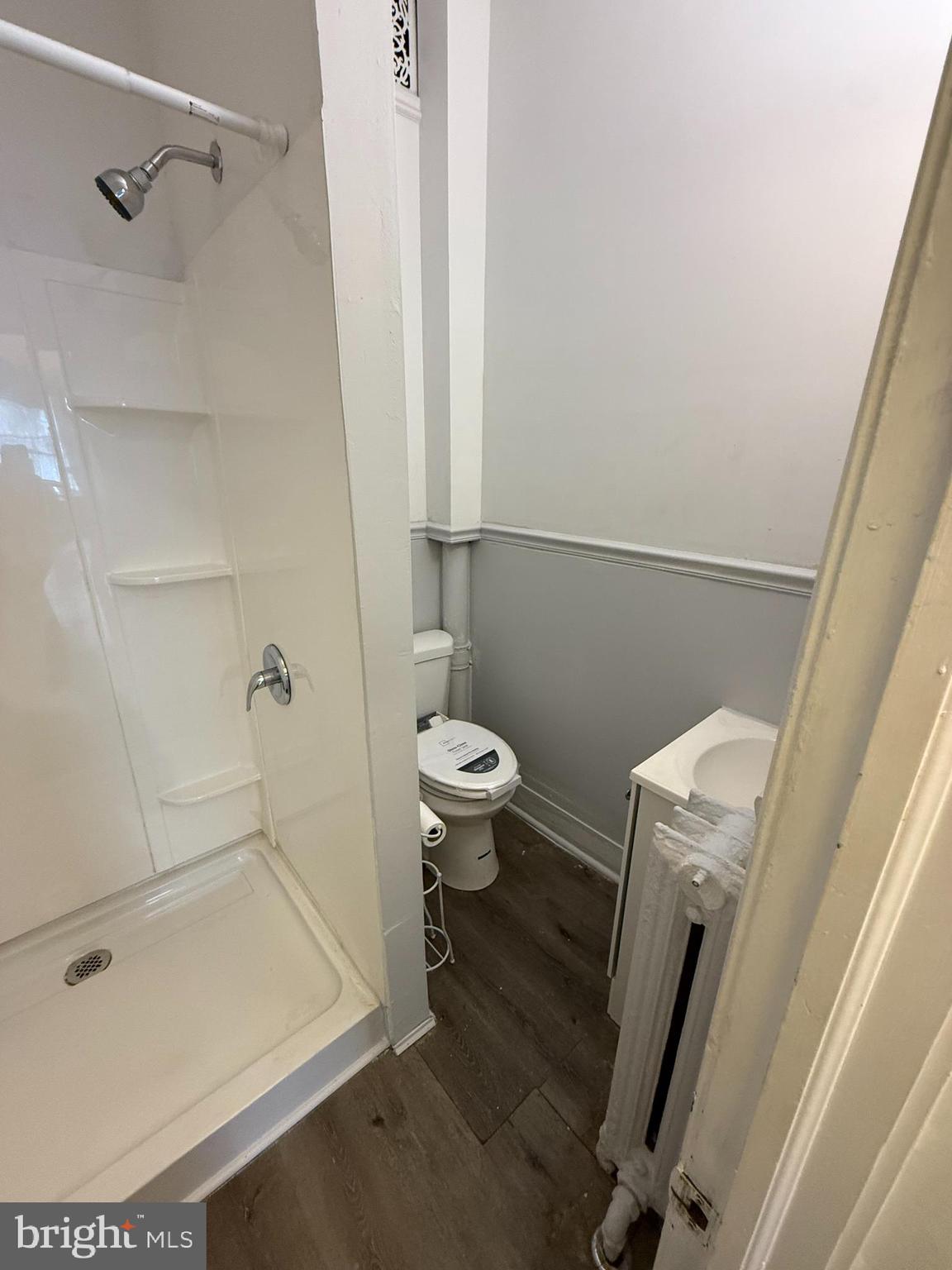 210 West State Street, Unit 3 Trenton, NJ 08608 - Photo 11 of 11 a bathroom with a toilet and a shower