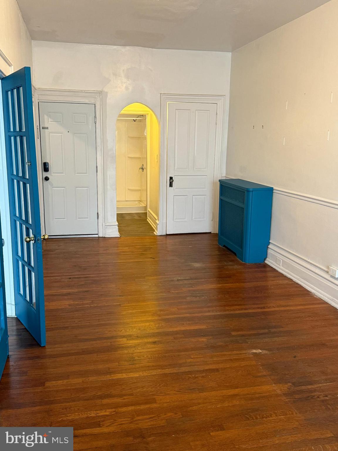 210 West State Street, Unit 3 Trenton, NJ 08608 - Photo 9 of 11 a view of room with window and wooden floor