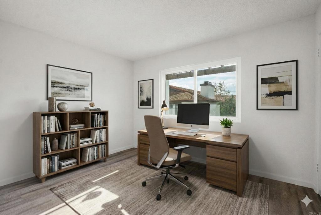 9829 Caspi Gardens Drive, Unit 6 Santee, CA 92071 - Photo 17 of 23 a view of a workspace with furniture and bookshelf