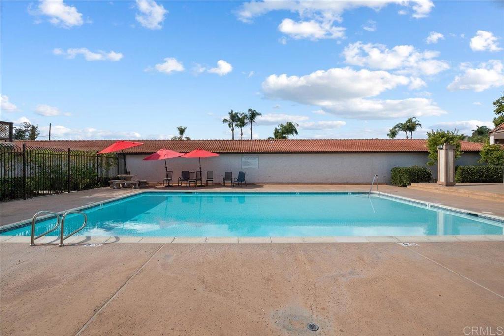 9829 Caspi Gardens Drive, Unit 6 Santee, CA 92071 - Photo 23 of 23 a view of a street with a houses